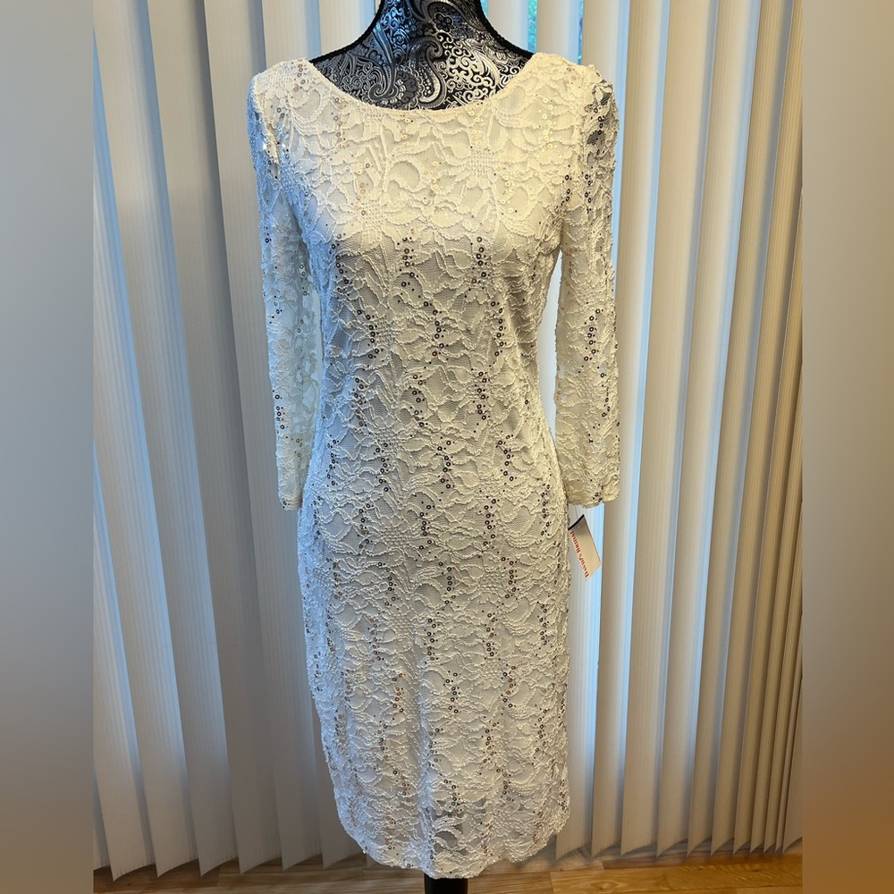 Onyx Ivory long sleeved dress. Size 6